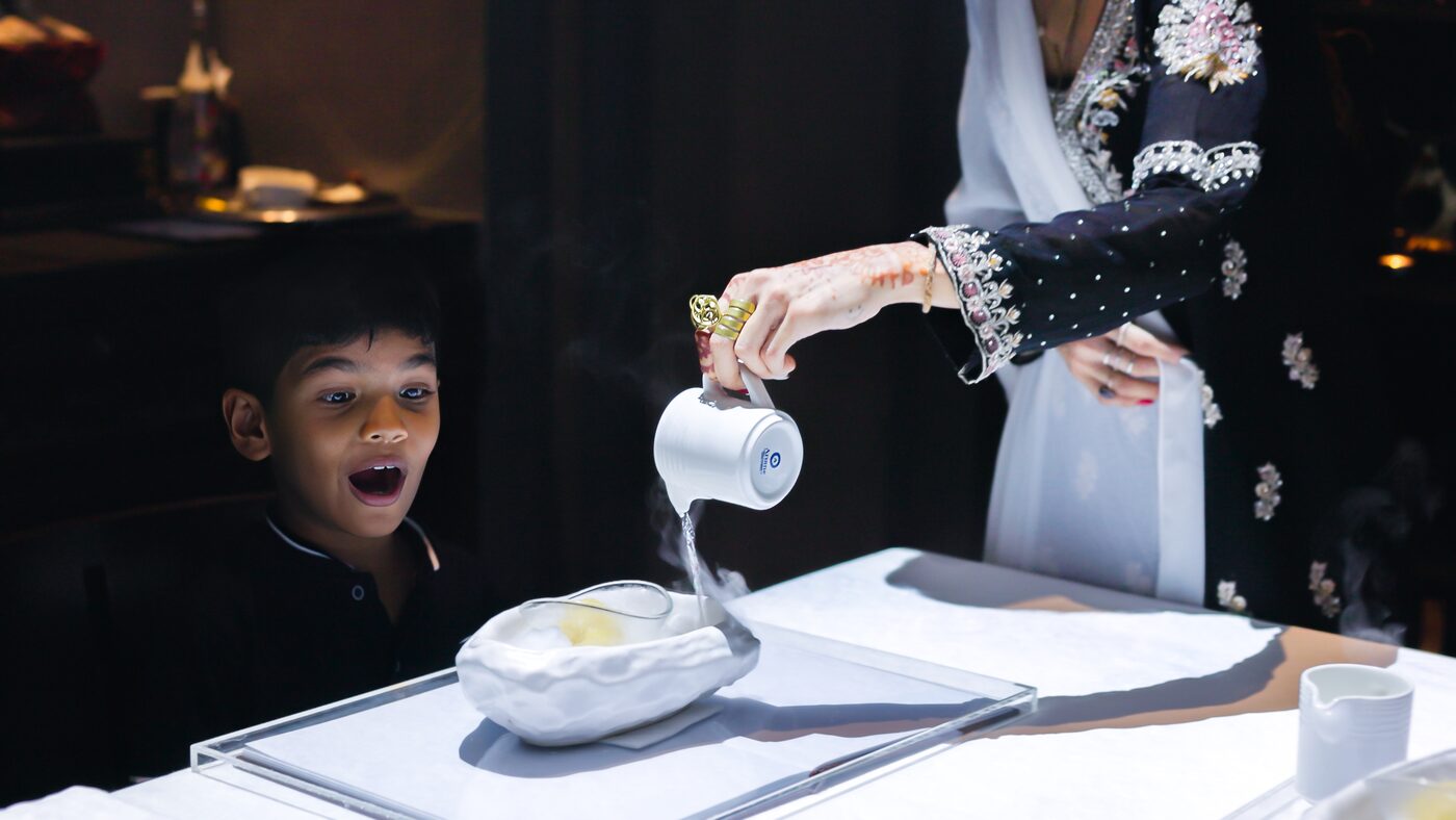 Guest enjoying the Le Petit Chef dinner